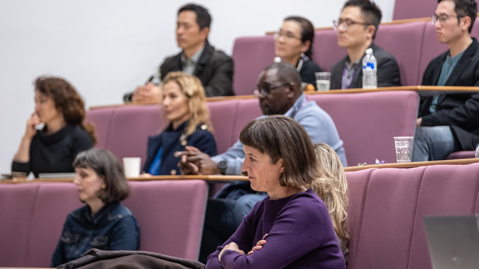 An audience of Loughborough academics listens to presentations at the launch of the new Business School research themes.
